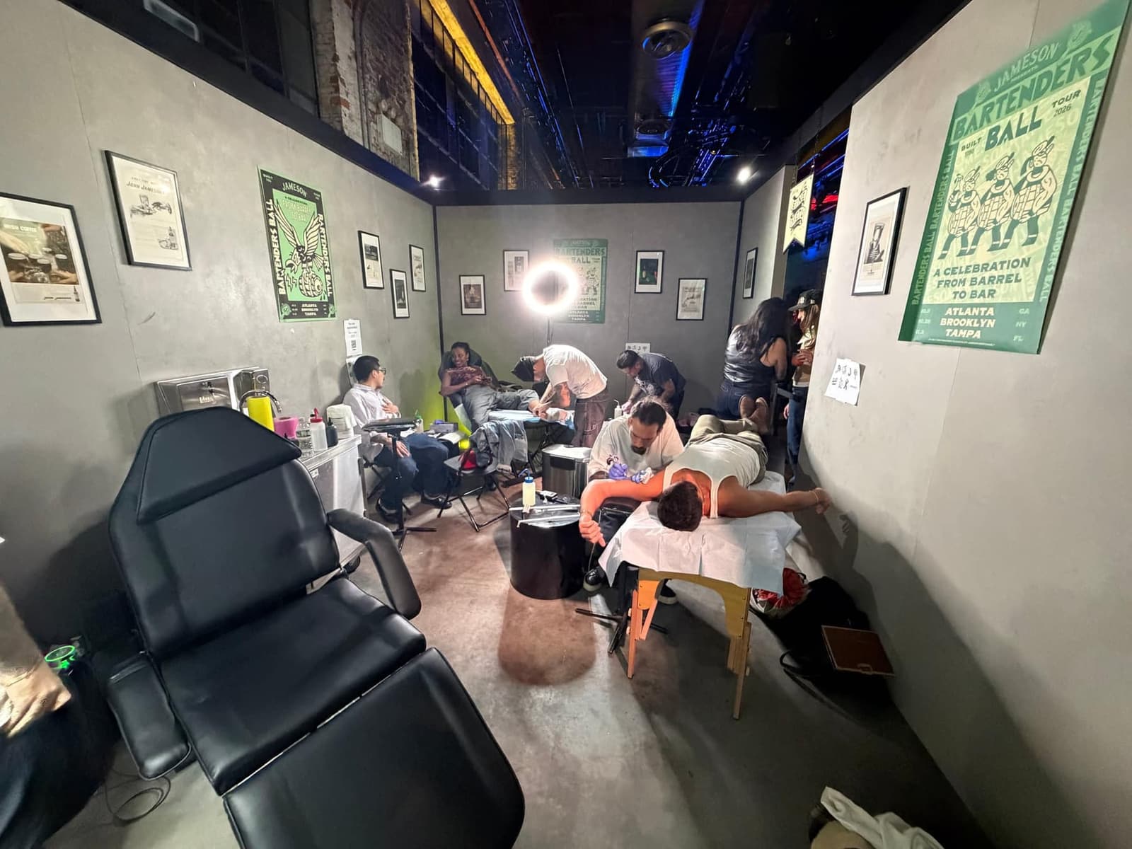 Fun City Tattoo's artists tattooing guests in the flash room at the Jameson Bartender's Ball